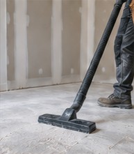 Vacuuming a construction work area