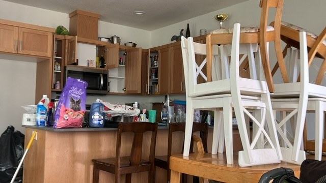 Kitchen and dining-area furniture before removal.